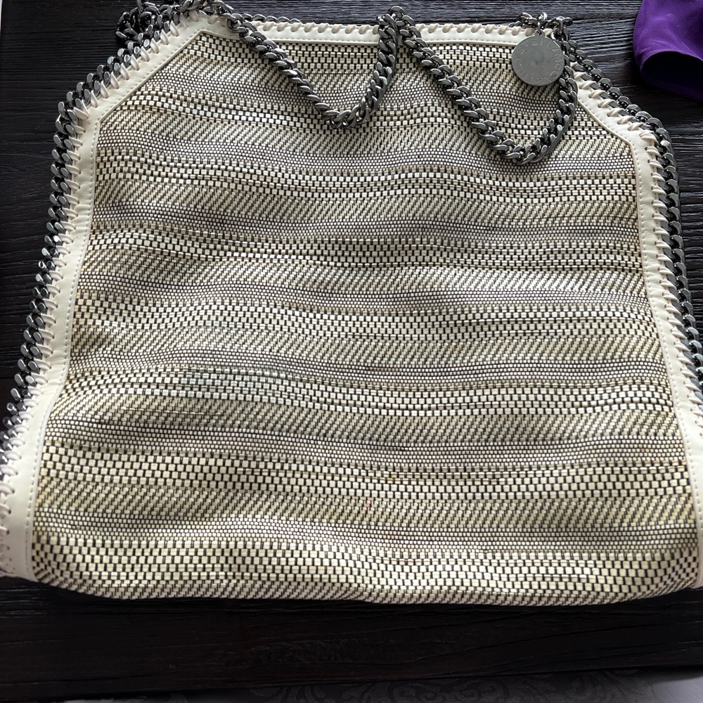 White and black hand bag